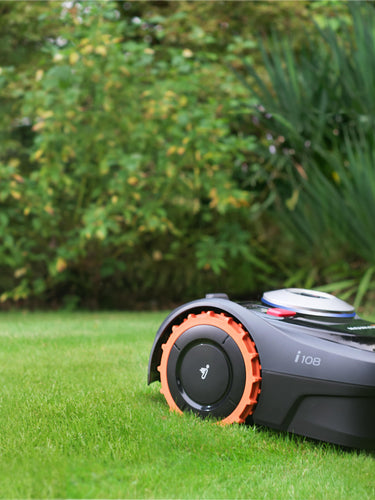 Husqvarna Petrol Lawn Mower with rollers, available online at Greenstripe UK