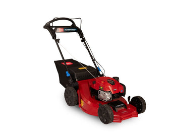 A red self-propelled lawn mower with a black handle and wheels, featuring a smartstow design for easy storage. Greenstripe