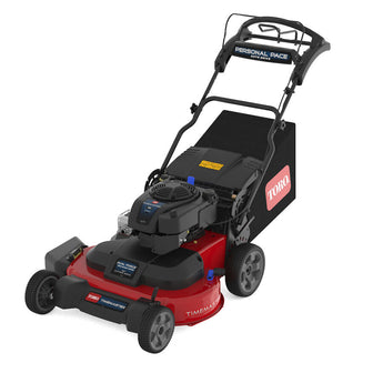 Red and black Toro lawn mower on a white background. Greenstripe